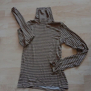 Damen Rollkragenpullover AMISU Größe M Farbe Hellbraun / Schwarz - Bild 1 von 1