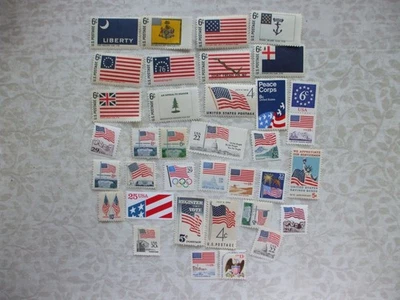 LOT 35 VINTAGE FLAG US POSTAGE STAMPS UNUSED HINGED  COLLECTION - Image 1 of 3