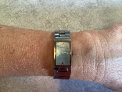 Coach W040 Swiss Made Women's Stainless Steel Silvertone Quartz Watch WORKS - Image 1 of 4