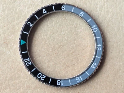 Inserto y bisel acrílico genuino vintage años 60 Zodiac Aerospace GMT negro/gris Foto 1 de 4