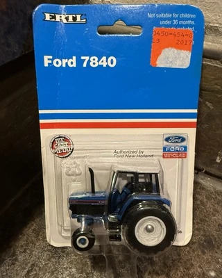 Ford 7840 Ertl Die-Cast Tractor 1/64 Scale New Holland Toy - Image 1 of 2