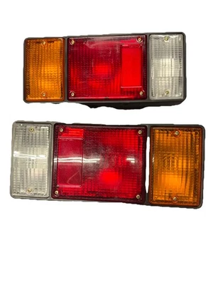 Isuzu Elf NPR NKR NHR NLR NQR NRR FSR FRR Truck Rear Tail light Lamp 12V Pair - Image 1 of 4
