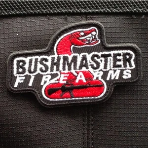 BUSHMASTER FIREARMS MILITARY TACTICAL HOOK PATCH SNAKE EMBROIDERED RED  - Picture 1 of 3