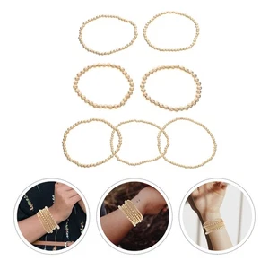 7 Stück Golden Perlen Armband Liebhaber Miss Bohemian Vorsteckarmbänder - Bild 1 von 12