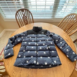 Piumino uomo NORTH FACE Olympic Nuptse Navy Stars 700 misure L usato in ottime condizioni - Foto 1 di 13