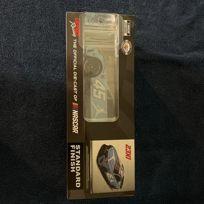 Tyler Reddick SIGNED 2023 Jordan Brand 1/24 Autographed Carolina Blue 1/996 - Image 1 of 4