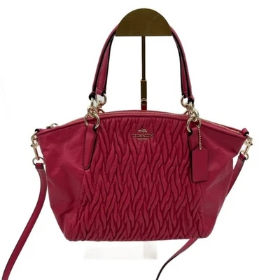 Bolso de mano Coach Kelsey de cuero rosa 9x11" Foto 1 de 4