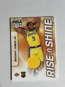 2024-25 Panini NBA Hoops - Rise N Shine Memorabilia Bronny James (RC) #RSM-BJL - Bild 1 von 2
