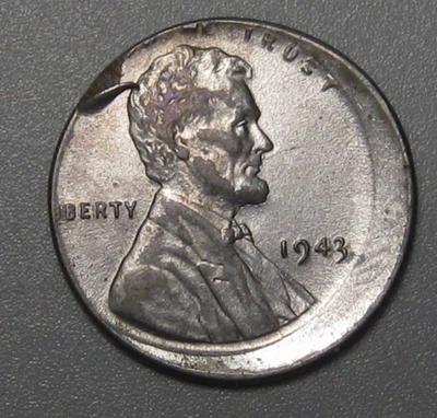 DOUBLE ERROR: BU 1943 Lincoln Steel Penny. FINGER EJECTION & OFF-CENTER. - Image 1 of 4