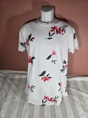 Camiseta Hollister Para Hombre M Dobladillo Curvo Ajuste Longline Blanco Rosa Estampado Floral  Foto 1 de 4