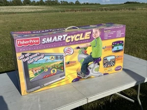 Fisher Price Bicicleta Inteligente Niños Bicicleta de Ejercicio Enchufes en TV y Caja - NUEVO - Imagen 1 de 7