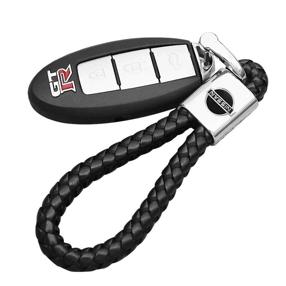 Porte clé NISSAN   neuf sous blister cuir corde tresser - Photo 1/1
