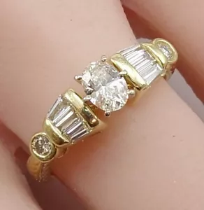 Anello di fidanzamento oro giallo 14 carati 0,80 ctw ovale taglio baguette diamante misura 6,75 LMH2 - Foto 1 di 8