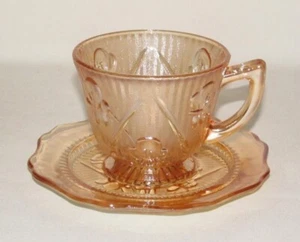 Jeannette Glass IRIS AND HERRINGBONE Marigold Iridescent Cup and Saucer Set - Picture 1 of 3
