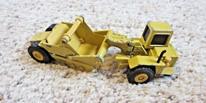 Rascador elevador Norscot 1/64 Caterpillar Cat 613C 1998 rueda diecast tractor - Imagen 1 de 4