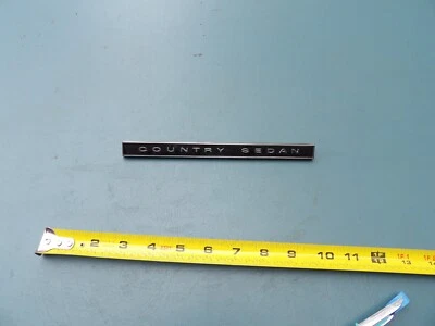 FORD 1965 СТРАНА СЕДАН ПРИБОРНОЙ ПАНЕЛИ ЭМБЛЕМА NOS - Изображение 1 из 4