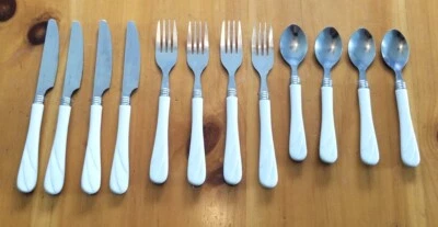 Cubiertos de acero inoxidable Gibson 12 piezas con mango de plástico perlado sintético Foto 1 de 4