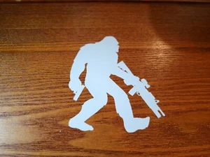 Sasquatch Bigfoot Rock On guns Funny DieCut Vinyl Window Decal Sticker Car Truck - Picture 1 of 2