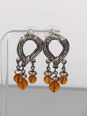 Pendientes colgantes estilo suroeste con dije redondo marrón ovalado cuerda tono plata Foto 1 de 4