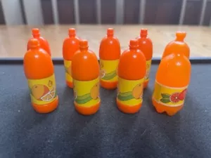 LOTE DE NUEVE BOTELLAS DE REFRESCO NARANJA MUÑECA BARBIE - Imagen 1 de 3