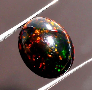 Piedra preciosa suelta cabujón forma ovalada ópalo etíope negro natural 8,8 quilates 18X14X8 mm - Imagen 1 de 3