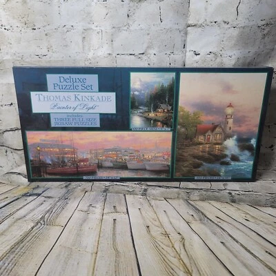 Thomas Kinkade Painter of Light 3 Deluxe Jigsaw Puzzle Sets 100/550/700 Pieces - Image 1 of 4