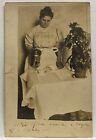 Real Photo Postcard RPPC ~ Woman Servant Pours Coffee  near Large Potted Plant