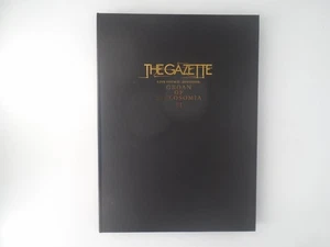 Libro del programa The GazettE LIVE TOUR12 DIVISION GEAN OF DIPLOSOMIA 01 - Imagen 1 de 3