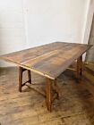 rustic dining table On Trestles