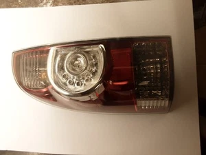 Driver Left Tail Light With LED Fits 08-15 TACOMA 10300755 - Picture 1 of 13