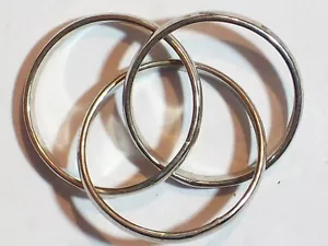 SPIELZEUG MAGISCHE RINGE 3 RINGE 3/4 ZOLL INNENDURCHMESSER METALL SILBERFARBEN - Bild 1 von 3