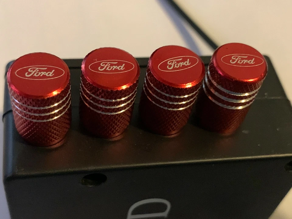 4x Tapas de vástago de válvula de neumático RED FORD para montaje universal de automóvil, camión ENVÍO GRATUITO Foto 1 de 4