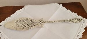 Antique  silverplated serving spoon with fish design