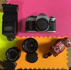 Canon AE-1 With Kit - Extra Lens, Strap And Auto Light. - Picture 1 of 7