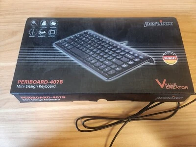 Perixx Periboard-407b Mini Design USB Keyboard 5.9ft cable 11 hot keys - Image 1 of 4