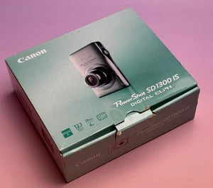 Cámara digital Canon PowerShot SD1300 IS ELPH 12,1 MP 4x zoom ancho con SD - probada - Imagen 1 de 17