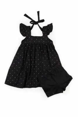 Conjunto túnica y flores Omi Jo bien vestida corazón lobo estrellas negras y doradas 7 años nuevo con etiquetas Foto 1 de 2