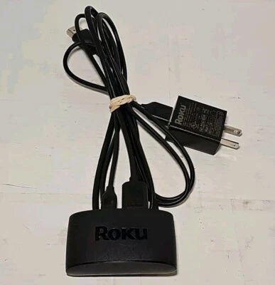Dispositivo multimedia de transmisión Roku modelo 3930X con fuente de alimentación y cable HDMI, buen estado. Foto 1 de 2