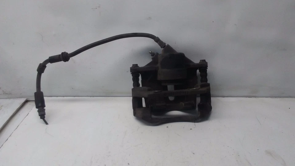 Pinza de freno delantera izquierda del lado del conductor Jaguar X-Type 2002-2006 OEM DK60851 Foto 1 de 4