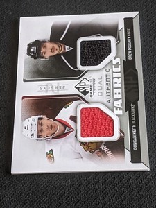 2014-15 UD SP GAME USED DUNCAN KEITH DREW DOUGHTY DUAL AUTHENTIC FABRICS JERSEY