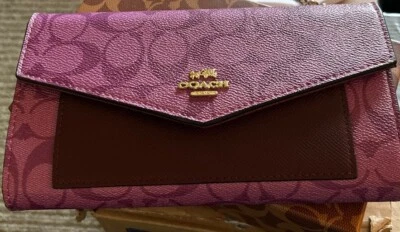 Carteras sobre coach para mujer de cuero Foto 1 de 4