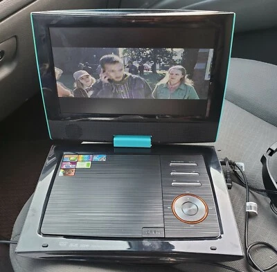 DVD player portátil AUDIOVAX 9” DS9849- FONE DE OUVIDO - ACESSÓRIOS adaptador de carro  - Imagem 1 de 4