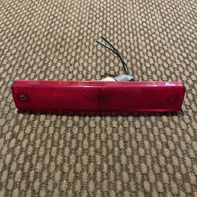 Reflector lateral parachoques trasero Mitsubishi Expo LRV 1992-1994 FABRICANTE DE EQUIPOS ORIGINALES Foto 1 de 2