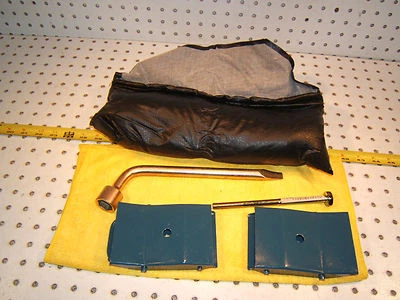 Mazda 1990 RX7 GTU in trunk tool kit OEM 1 set of 4 Pieces & Black foam 1 Pouch - Image 1 of 4