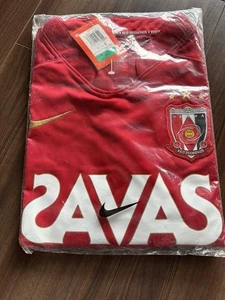 Urawa Reds 2009 Heim Trikot Kurzarm XL Deadstock Neu Ungeöffnet - Bild 1 von 4