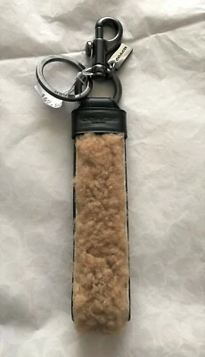 Novo com etiquetas Coach C1507 chaveiro grande laço Gunmetal/preto neutro - Imagem 1 de 2