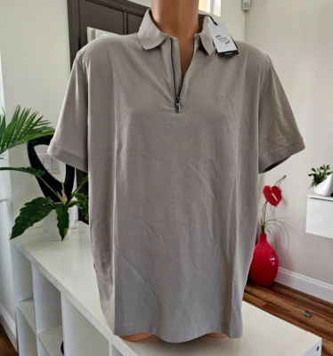 Nueva camiseta polo Armani Exchange de algodón con cremallera A|X logotipo manga corta para hombre Foto 1 de 4