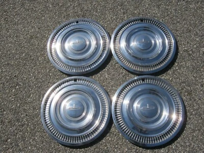 Oldsmobile 98 Delta 88 14 pulgadas tapacubos originales de fábrica 1963 1964 cubiertas de rueda Foto 1 de 4