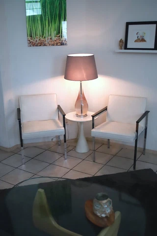 Pair of Vintage Modern Chrome and White Vinyl Arm Chairs Black Ebony wood arms Cover