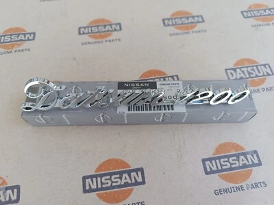 DATSUN 1200 Trunk Lid Emblem Boot Badge Genuine (Fits NISSAN B110 B120 B122 Ute) - Image 1 of 3